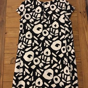A geometric black and white dress